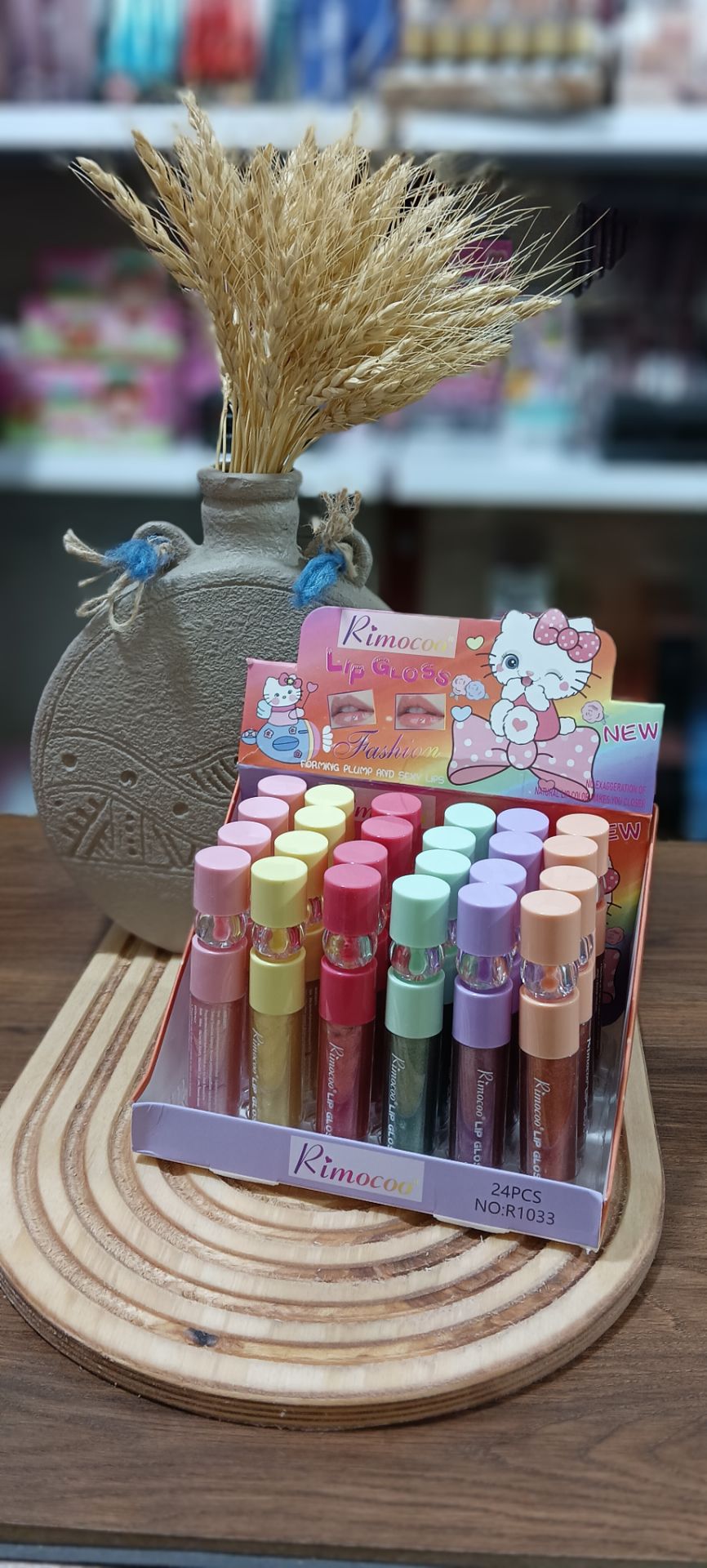 شاین لب شاین دار رنگی رنگ بنفش و سبز موجوده